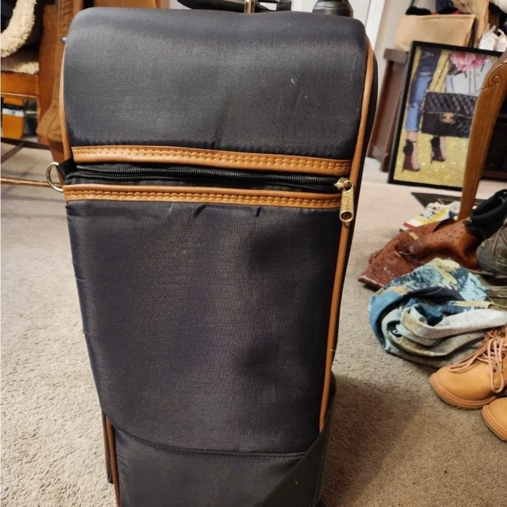Luxurious Black and Brown Travel Bag with Multicolor Accents